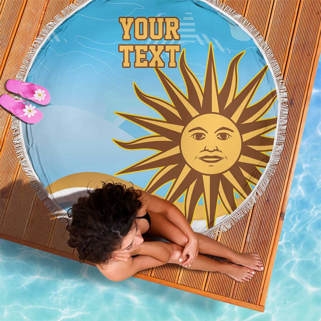 Blue round beach blanket with white fringe, sun face and "YOUR TEXT" print