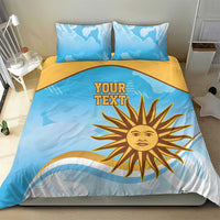Blue duvet cover set with large yellow sun emblem and custom text, two pillowcases