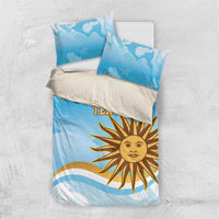 Blue duvet cover set with yellow sun emblem, custom text, two blue pillowcases
