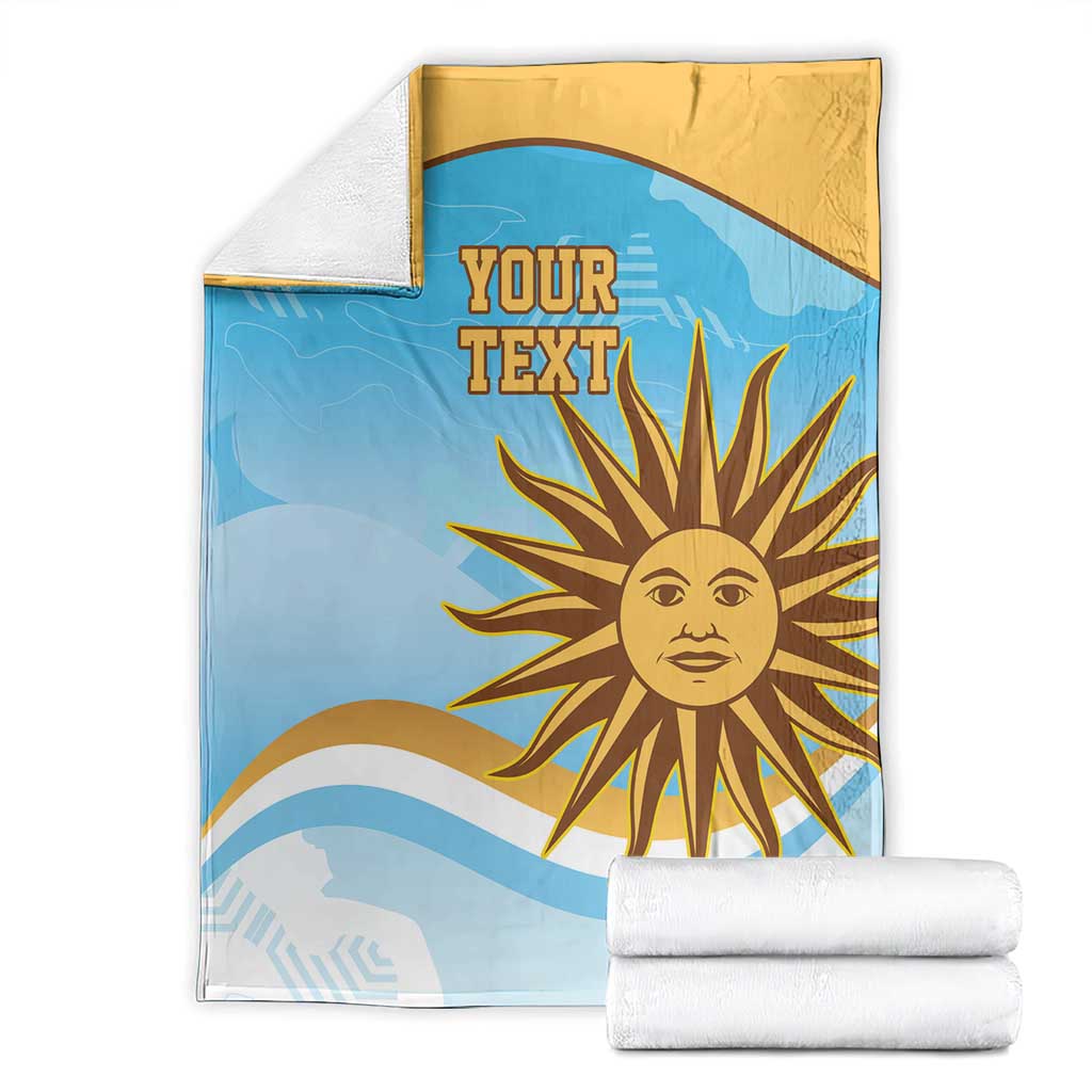 Blue and gold rugby blanket with 'YOUR TEXT' sun print, folded with rolled sets