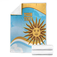 Blue and gold rugby blanket with 'YOUR TEXT' sun print, folded with rolled sets