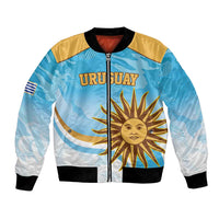 Light blue bomber jacket with black ribbed trim, full zip, Uruguay sun graphic
