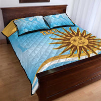 Blue quilt bed set with yellow sun graphic and 'TEXT' on cover, with two pillows