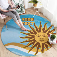 Blue round rug on floor with cartoon sun face and "YOUR TEXT" print