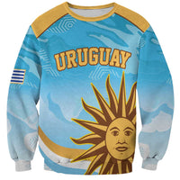Blue Uruguay rugby sweatshirt with golden sleeves and sun-face graphic, front
