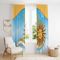 Window curtain panels with blue and gold Uruguay sun motif