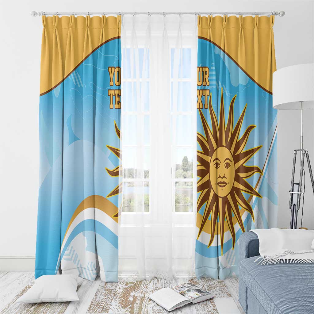 Window curtain panels in blue with gold sun emblem, centered over window