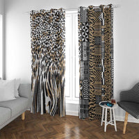 Side view of window curtains with mixed leopard print and tribal patterns in beige and black.