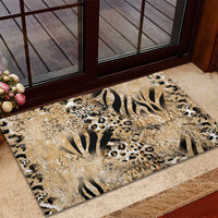 Beige rubber doormat with mixed zebra, leopard, and tiger pattern in black