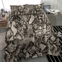 Snake-skin patterned duvet cover with two matching pillowcases in black and cream