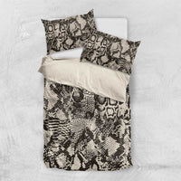 Folded snake-skin bedding set with duvet cover and two pillowcases, black and cream