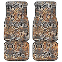 Four vintage snake-skin patterned car floor mats, beige, black, and white