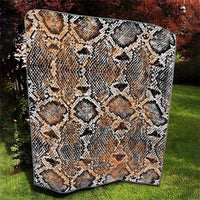 Snake-skin patterned quilt, beige tan with black and white diamond scales and dots