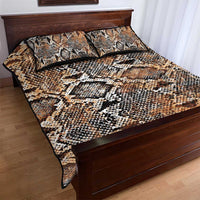 Snake-skin pattern quilt bed set with two pillows, quilt laid flat on a wooden bed