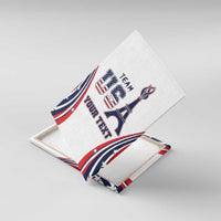 Folded white canvas print showing “TEAM USA,” Eiffel Tower graphic, and “YOUR TEXT”