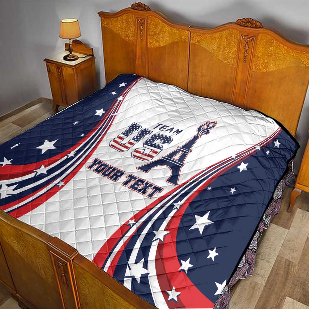 Personalized USA quilt on bed with navy star border, Eiffel tower and red/blue stripe design