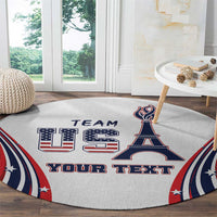 Round carpet featuring Eiffel Tower, 'TEAM' and 'YOUR TEXT' over light gray background