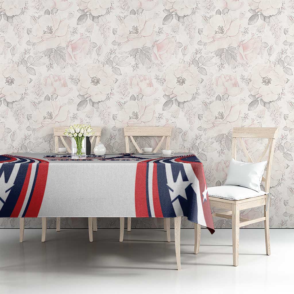 Patriotic tablecloth with navy stars and red-white stripe panels on dining table