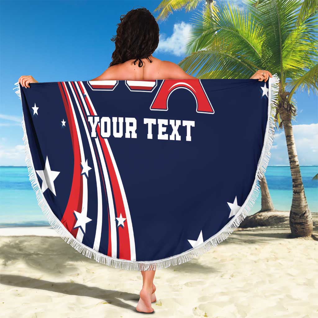 Round blue beach blanket with USA flag and 'YOUR TEXT' print, white fringe edge.