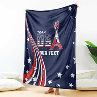 Blue USA blanket draped on sofa with flag sweep, Team USA emblem, and custom text