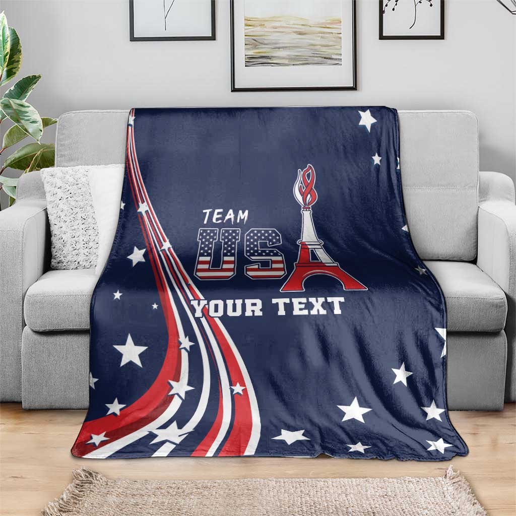 Blue fleece USA blanket on couch with Team USA emblem, star details, and custom text