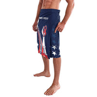 Blue patriotic graphic swim shorts with drawstring waist and front logo artwork