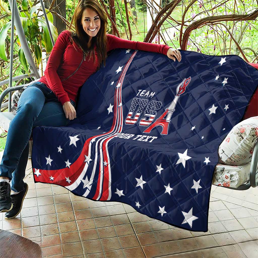 Navy quilt spread on patio furniture with stars and US flag ribbon design and custom text