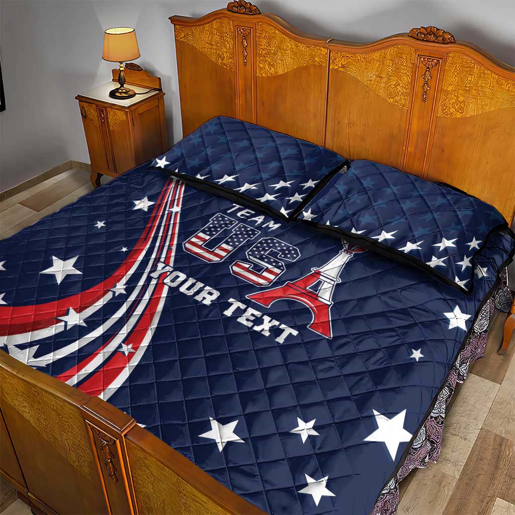 Blue quilt bed set with Team USA logo, Eiffel motif, stars and stripes; two pillowcases