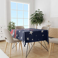 Navy tablecloth with white stars and red-and-white striped graphic across the edge