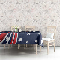 Navy tablecloth with US stars and stripes theme over dining table with chairs
