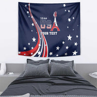 Blue tapestry with USA flag curves, white stars, Eiffel Tower, and team text