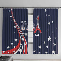 Blue window curtain panels with star and flag-style graphic and Eiffel Tower motif