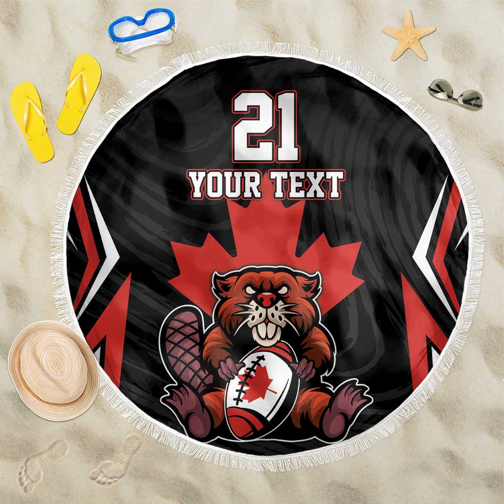 Round beach blanket with black base, red maple leaf center, beaver mascot, fringe