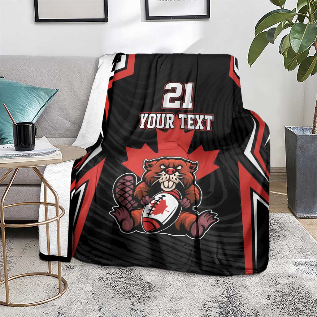 Black Canada rugby blanket over chair with red stripes, beaver and maple leaf, 21 YOUR TEXT