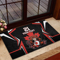 Black rubber doormat near doorway with red/white graphics, beaver mascot, and “21 YOUR TEXT”