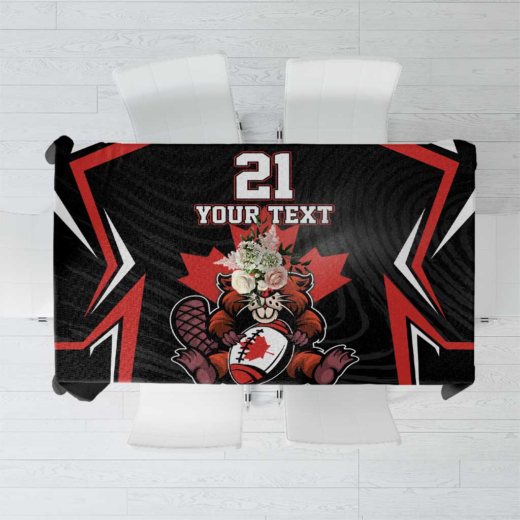 Black tablecloth with red trim, beaver and maple leaf graphic, custom text panel