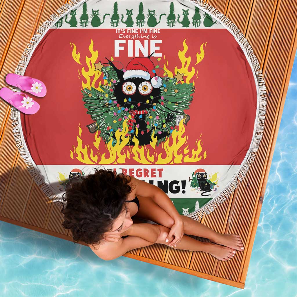 Red round beach blanket with white fringe and flaming cat design, holiday border print.