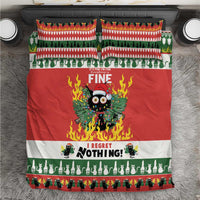 Christmas bedding set: red duvet with flaming owl graphic, green trim, two matching pillowcases