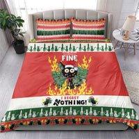 Christmas bedding set on bed: red duvet with flaming owl and "I regret nothing" text
