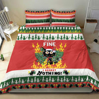 Christmas bedding set on bed: red duvet with flaming owl, green animal row and holiday stripe trim