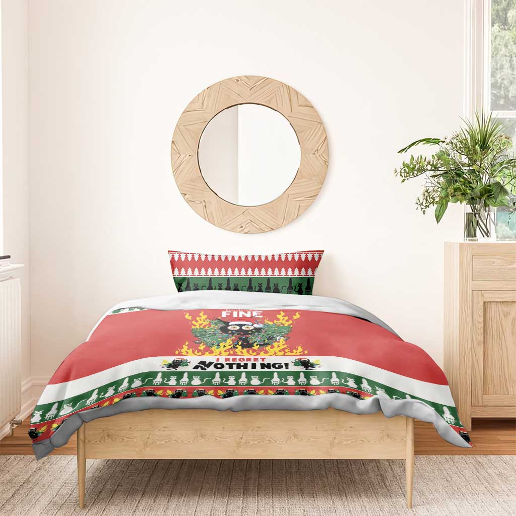 Christmas bedding set on single bed: red duvet with "Fine" flaming owl band and green border