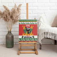 Cat-themed red and green canvas wall art displayed on a wooden easel
