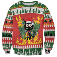 Red and green Christmas sweatshirt with large cat face in flames graphic.