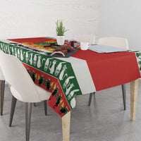 Christmas cat-themed tablecloth in red and green with repeating cat silhouettes and text bands