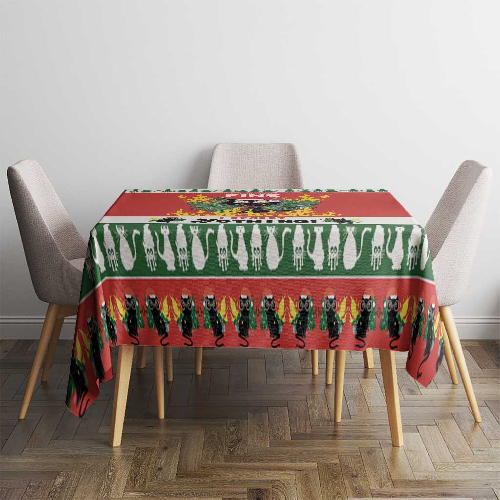 Red and green Christmas cat tablecloth on dining table with cat silhouette stripe print