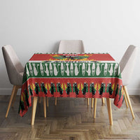 Red and green Christmas cat tablecloth on dining table with cat silhouette stripe print