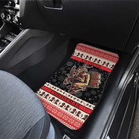 Krampus-themed car floor mat in black with red trim, festive border, and snowflake motifs