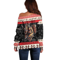 Off-shoulder holiday sweater, back view, red-and-black festive graphic, long sleeves