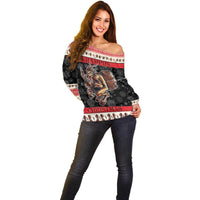 Off-shoulder holiday sweater in red-and-black with large festive graphic, long sleeves