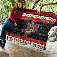 Krampus Christmas quilt blanket on patio with red stripes, black snowflakes, and monster medallion
